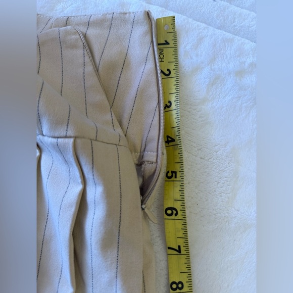 Zara Pleated Skort features a high waist, wrap front, side buckle, pleat details - Picture 7 of 16